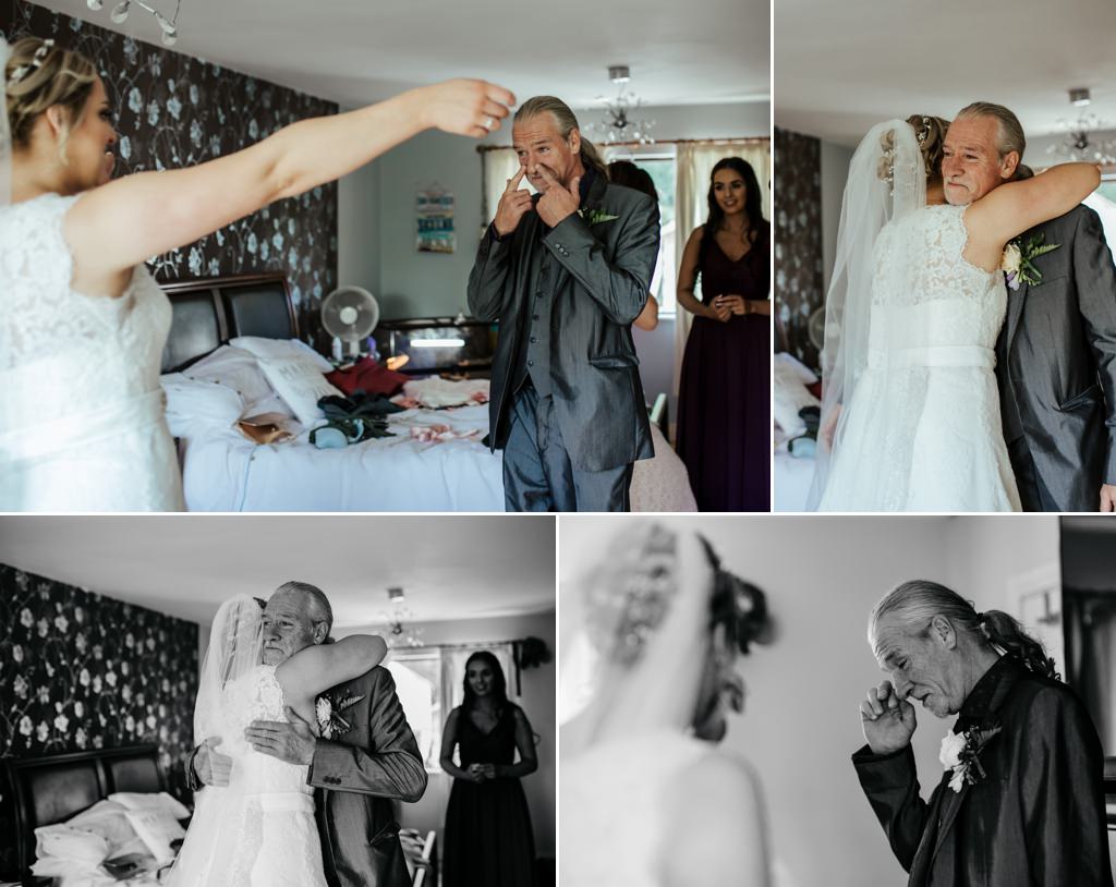 a tearful father daughter first look wedding photo
