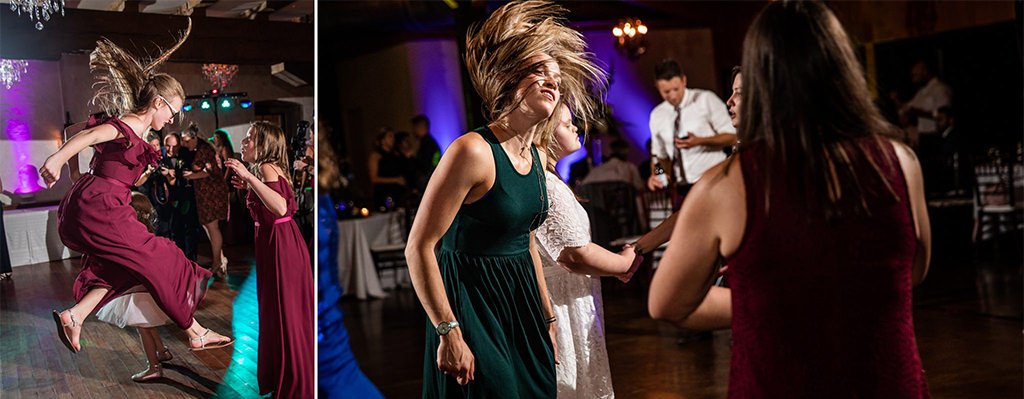 A photo of a girl jumping in the air and flipping her around on the dance floor at a wedding reception.
