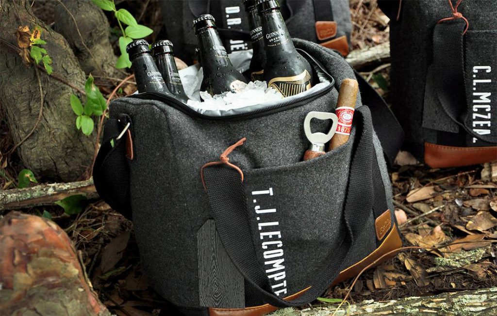 a beer cooler sitting on the ground. This is for a groomsmen gift