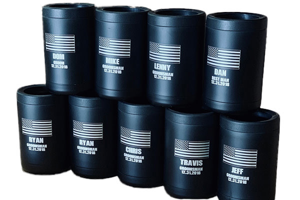 a stack of can coolers with American flags on them