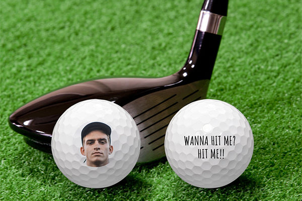 golf ball with a face on it