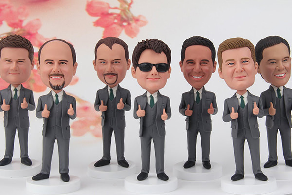 A group of groomsmen bobbleheads