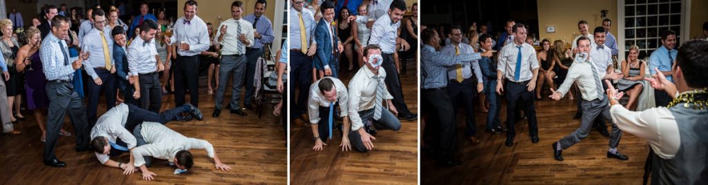A bunch of rowdy wedding guests diving for the garter after the groom tossed it to them. They removed the garter to a really funny song.
