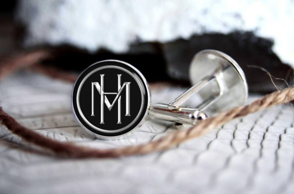 cufflinks sitting on a table