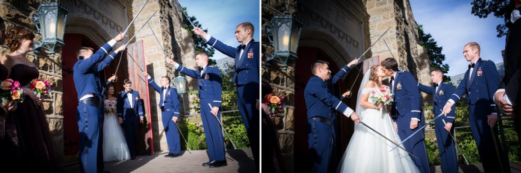A bride and groom exiting the wedding ceremony under a saber arch (swords)