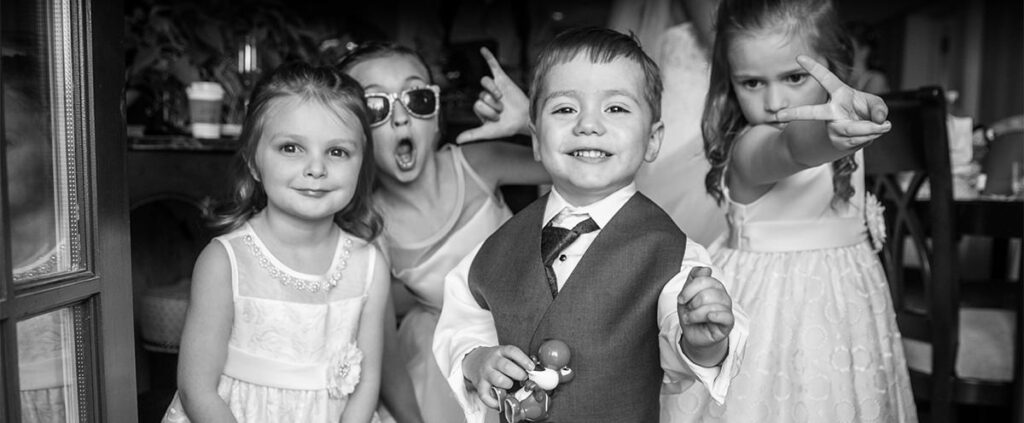 The flower girls and ring bearer having fun before the wedding.