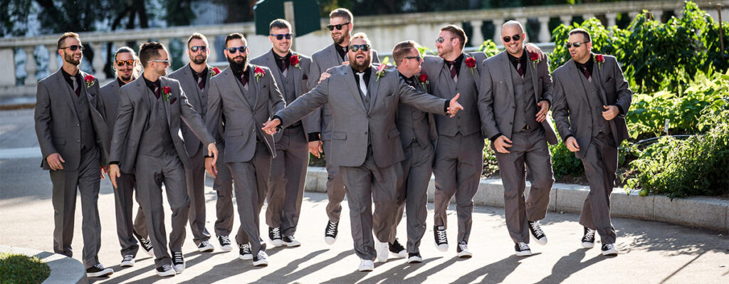 The groom and groomsmen walking.