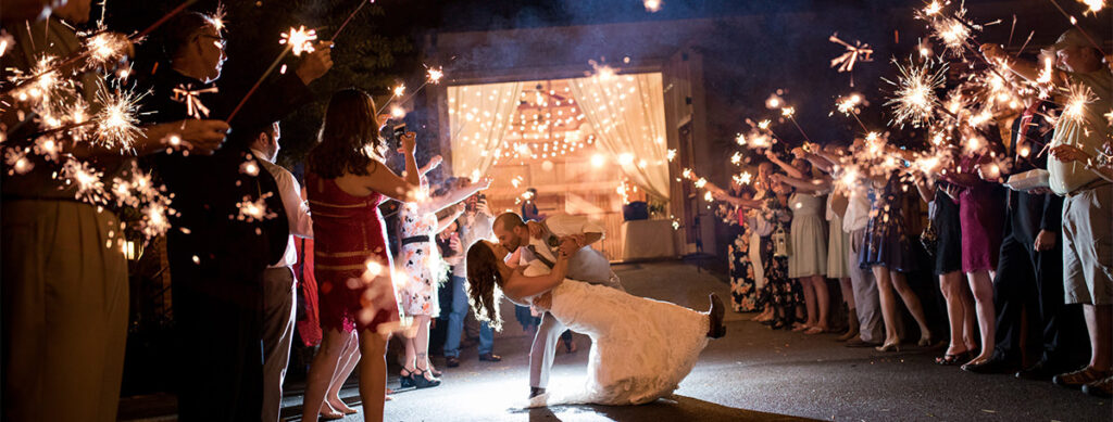 A wedding sparkler exit. This is a photo that should be included on the wedding photography shot list