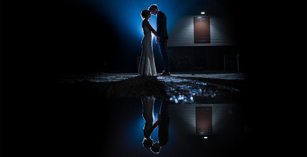 A bride and groom at night. This is for the article called how long does it take to get wedding photos back from the photographer?