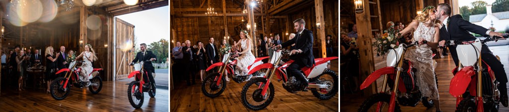 A bride and groom riding into their wedding reception on dirt bikes.