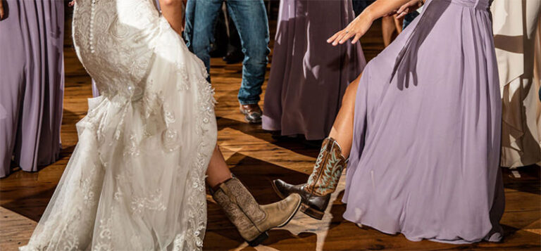 Close up of cowboy boots on a wedding reception dance floor