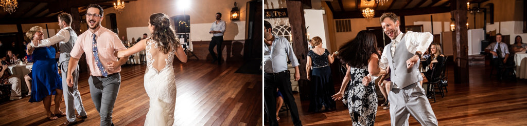 A bride and groom dancing to an upbeat song during the dollar dance at their wedding recpetion.