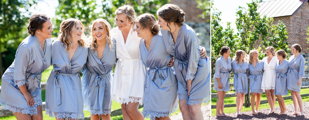 A bride and bridesmaids laughing while wearing robes. This is for the article called best bridesmaid captions for Instagram.