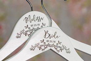 A personalized wedding dress hanger with a floral pattern