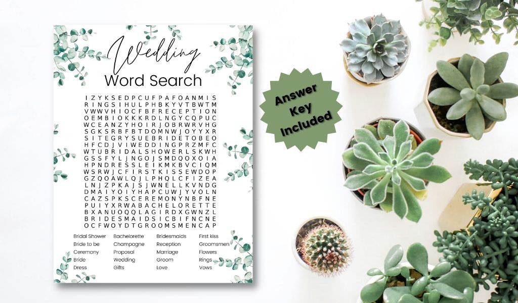 A word search printable game card for a bridal shower sitting on a table with green plants. This is for the article called wedding word search game card for bridal shower.