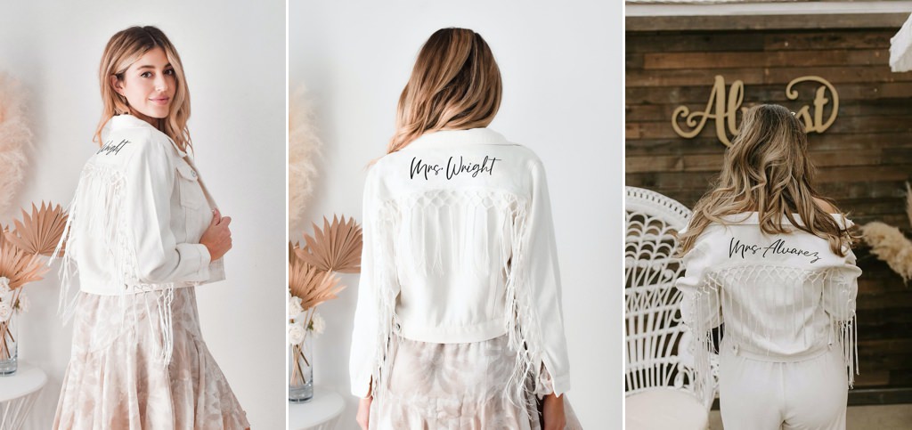 A bride wearing a white fringe jacket on her wedding day