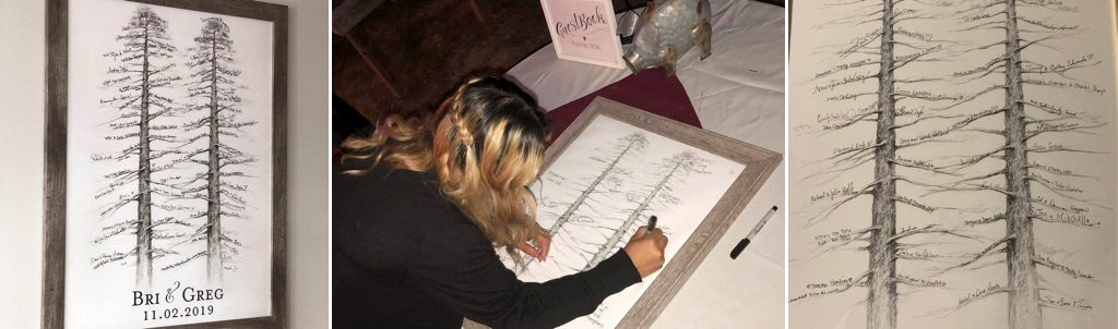 A wedding guest book that has a tree with branches for guests to sign