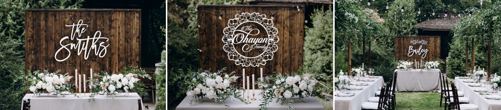 A close up photo of wedding welcome signs at a wedding reception
