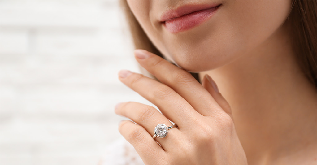 A bride showing off her new engagement ring.
