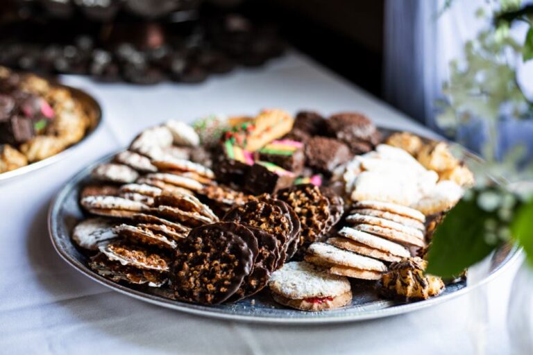 Cookies on a table at a wedding reception. This is the cover photo for the article called cheap wedding reception food ideas on a budget