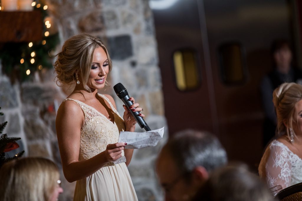 A Maid of Honor giving a toast to the bride. This is for an article called how to end a maid of honor speech