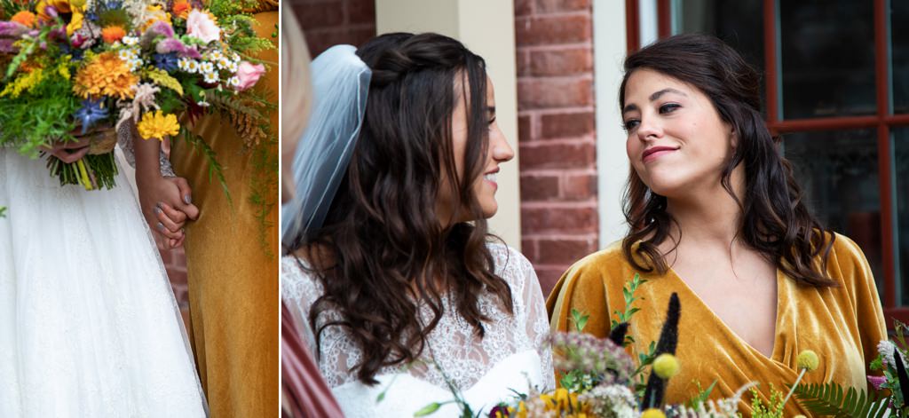 A Maid of Honor holding hands and looking at each other