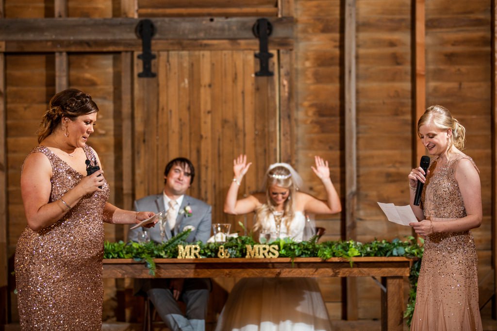 Two Maids of Honor giving wedding speeches