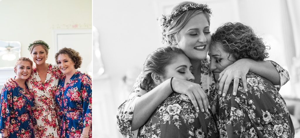 A bride posing with and hugging her maid of honor and matron of honor