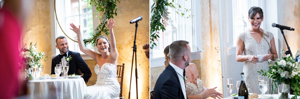 A Matron of Honor toasting the bride and groom as the bride puts her hands in the air