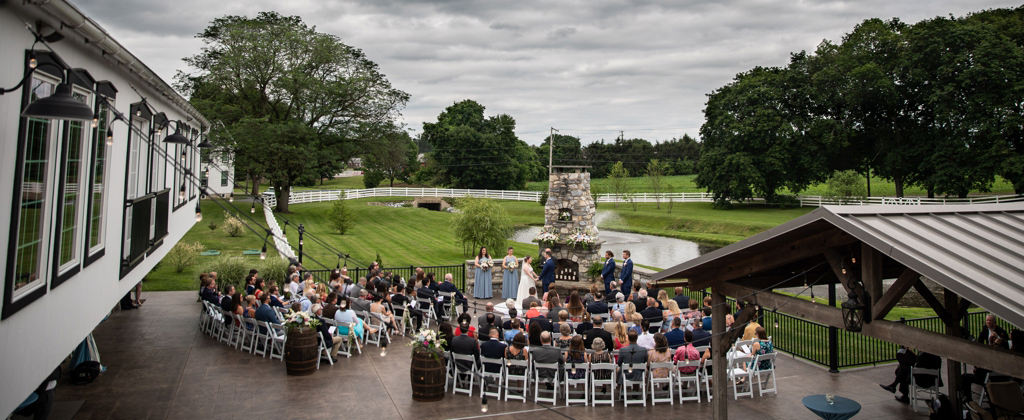 An outdoor wedding ceremony taking place