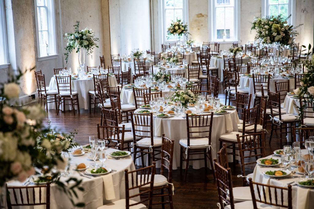 Wedding centerpieces using both tall arrangements and short arrangements