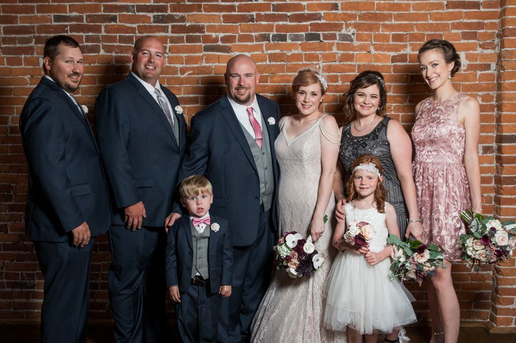 A small wedding party with only 2 people on each side