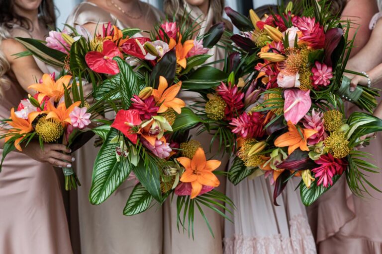 A group of bridesmaid bouquets that were made by the bride and bridesmaids using a diy tutorial