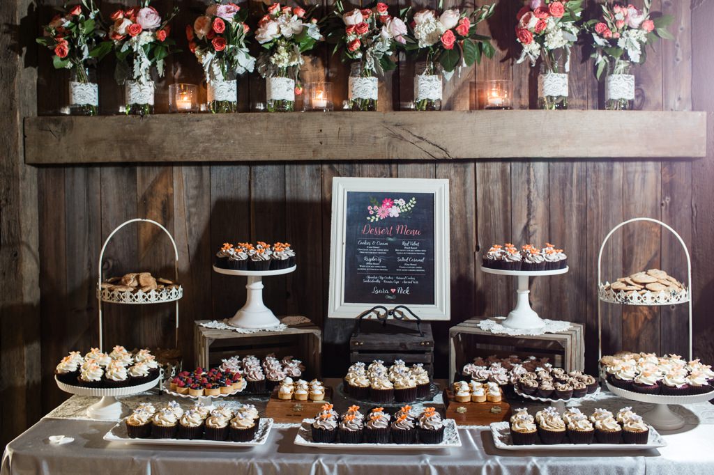 A beautiful wedding dessert table display with cupcakes