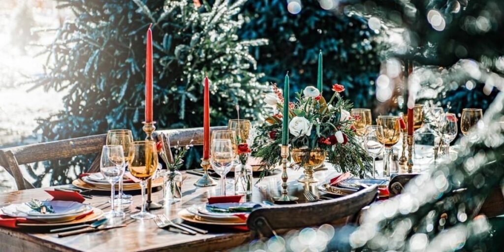 A gorgeous outdoor Christmas wedding setup with Xmas-styled centerpieces