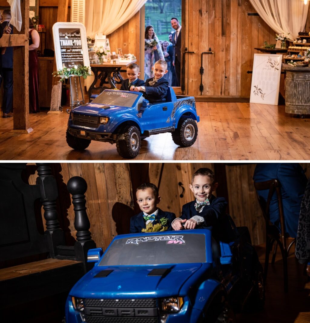 Two ring bearers riding into the reception in a mini truck power wheels.