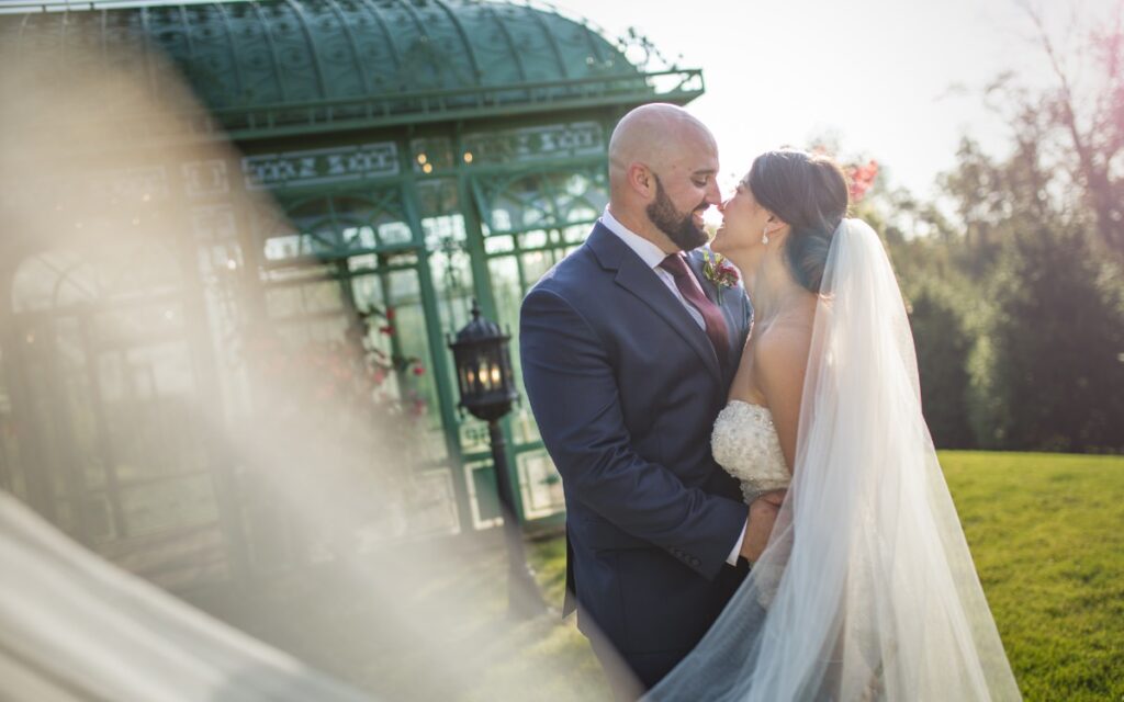 A bride and groom kissing