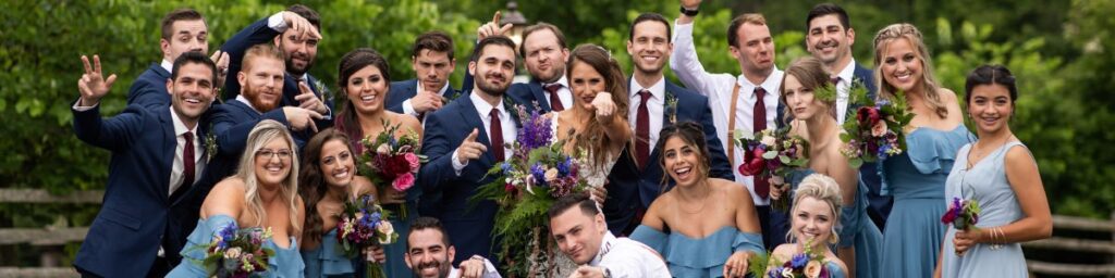 A wedding party posing