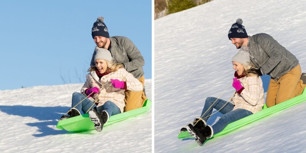 a couple sledding together