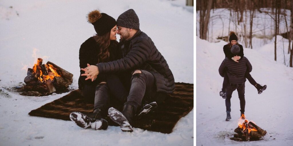 A couple posing by a campfire in the snow