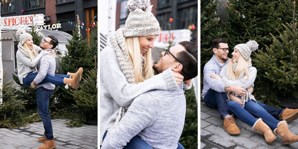 A couple posing for photos at a Christmas tree farm