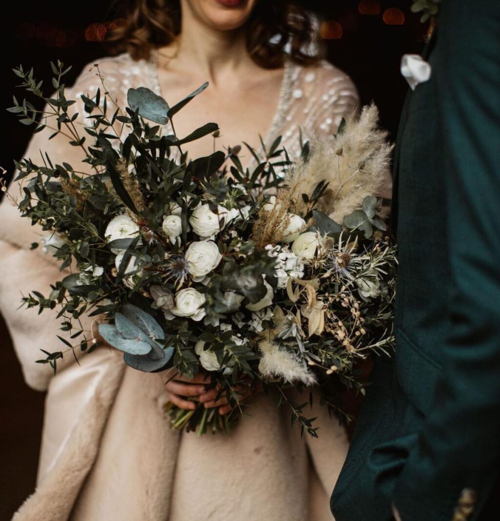 a dark and moody winter bridal bouquet