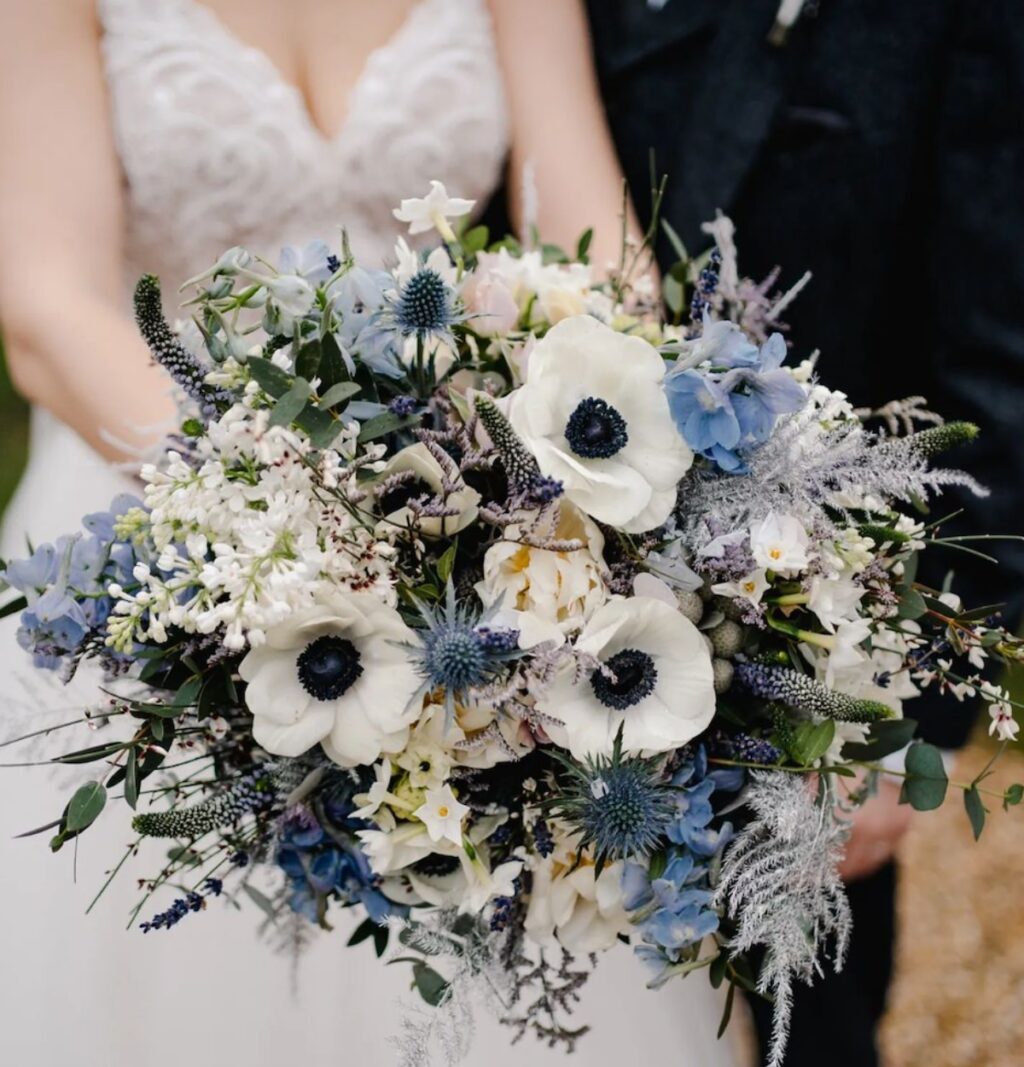 a close up of a winter bridal bouquet