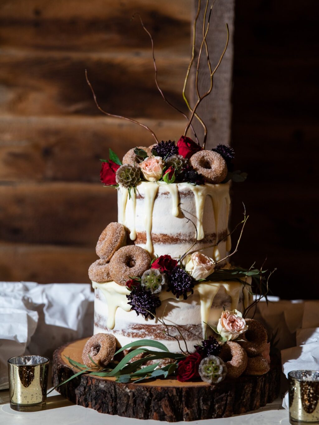 A small winter wedding cake with powdered donuts