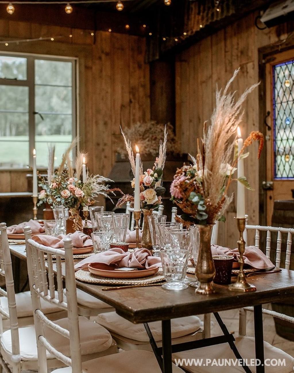 A rustic wedding reception table set up