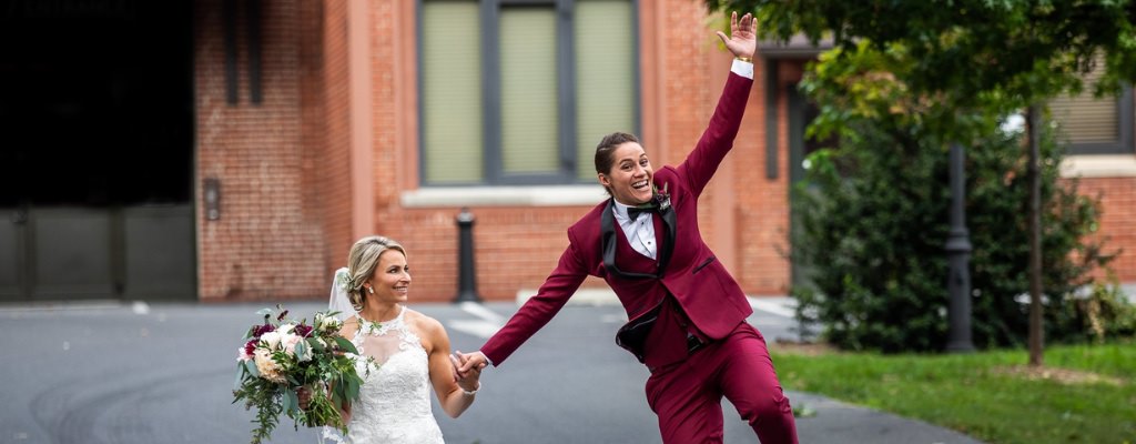 Two brides acting excited after getting married