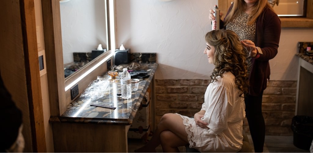 A bride getting her hair done