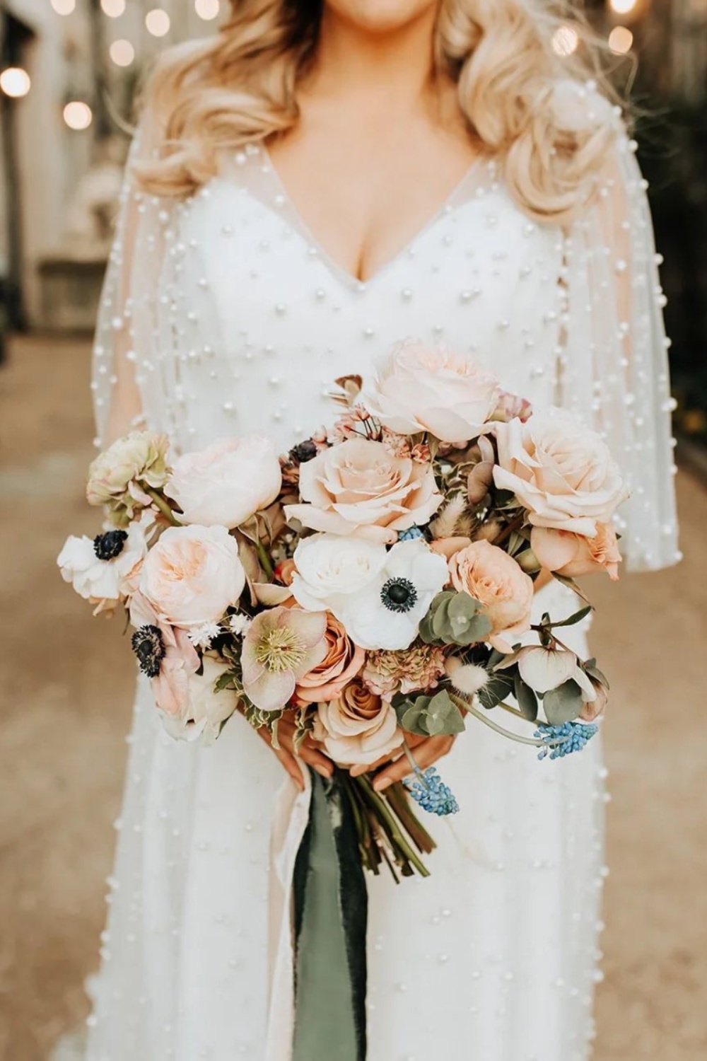 A beautiful light pink and white wedding bouquet