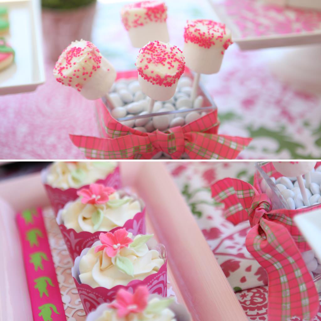 Pink cupcakes and marshmallow pops with sprinkled dots for a wedding reception