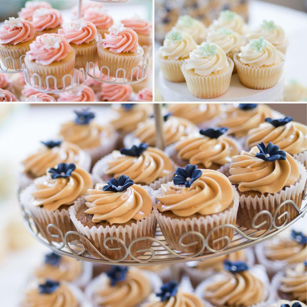Assorted wedding cupcakes on dessert table